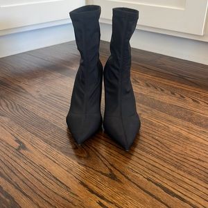 Mango black nylon sock bootie with black patent shiny stiletto heel.